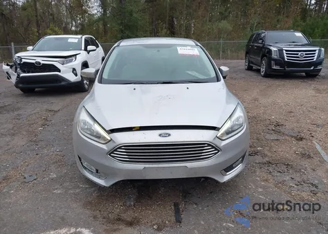 2016 Ford Focus Titanium z USA, uszkodzony, nr VIN 1FADP3N22GL298882